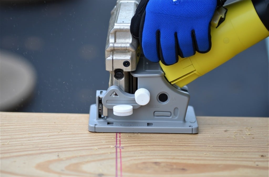 Beginner Tips: How to Use Power Tools for Your DIY Projects 5 a person using a jig saw